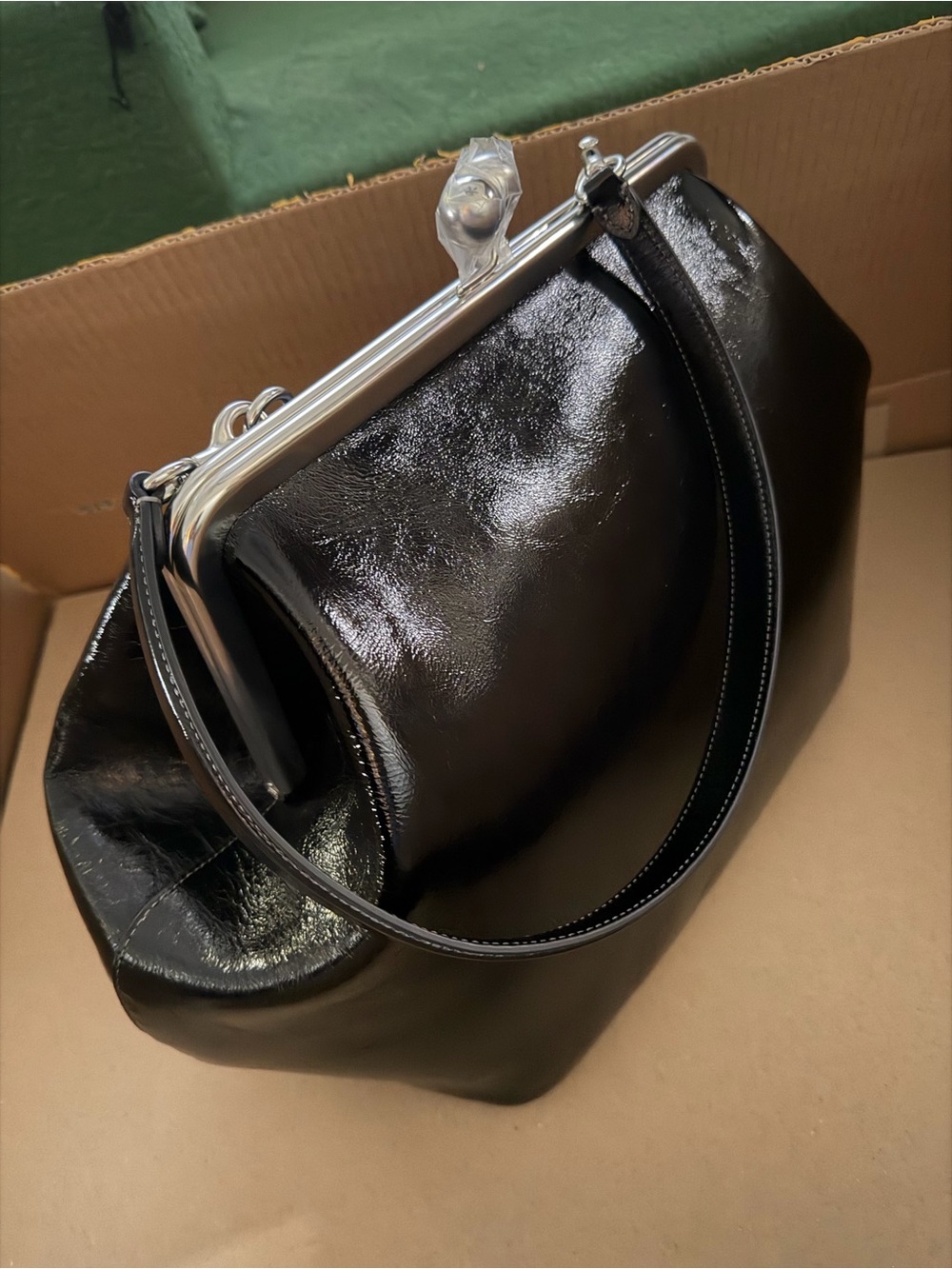 Coach Kisslock in glazed leather w silver hardware from Devil Wears Prada movie